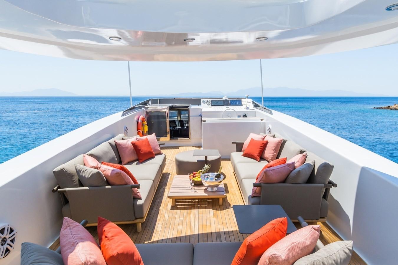 a living room with a large ocean aboard AXELLA Yacht for Sale
