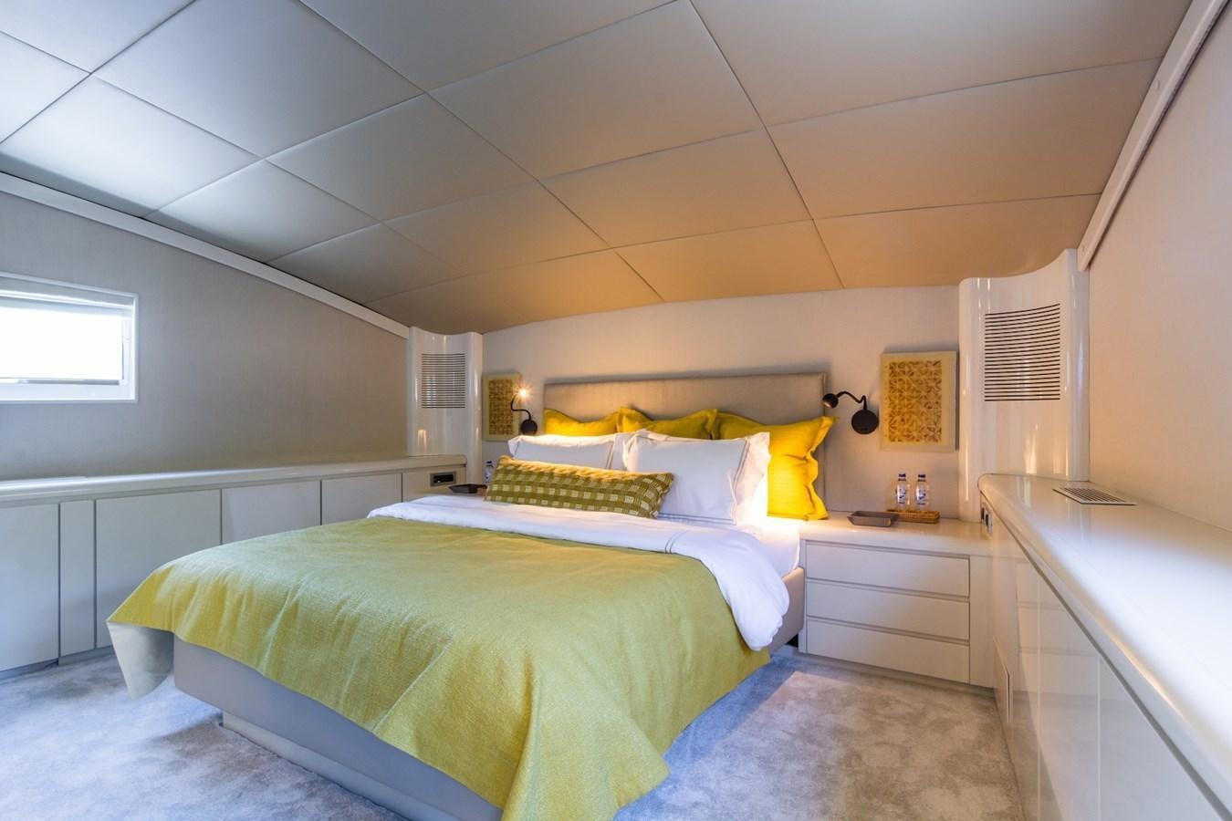 a room with two beds aboard AXELLA Yacht for Sale