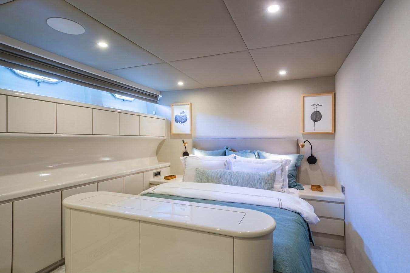 a couple of beds in a room aboard AXELLA Yacht for Sale