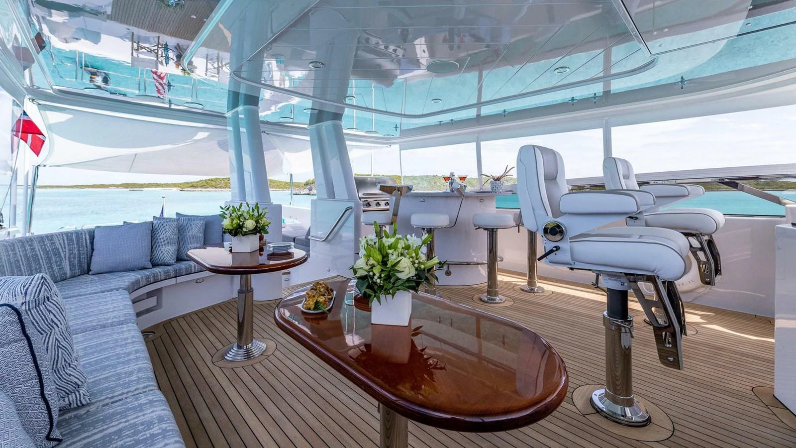 a room with a table and chairs aboard NO SHORTCUTS Yacht for Sale