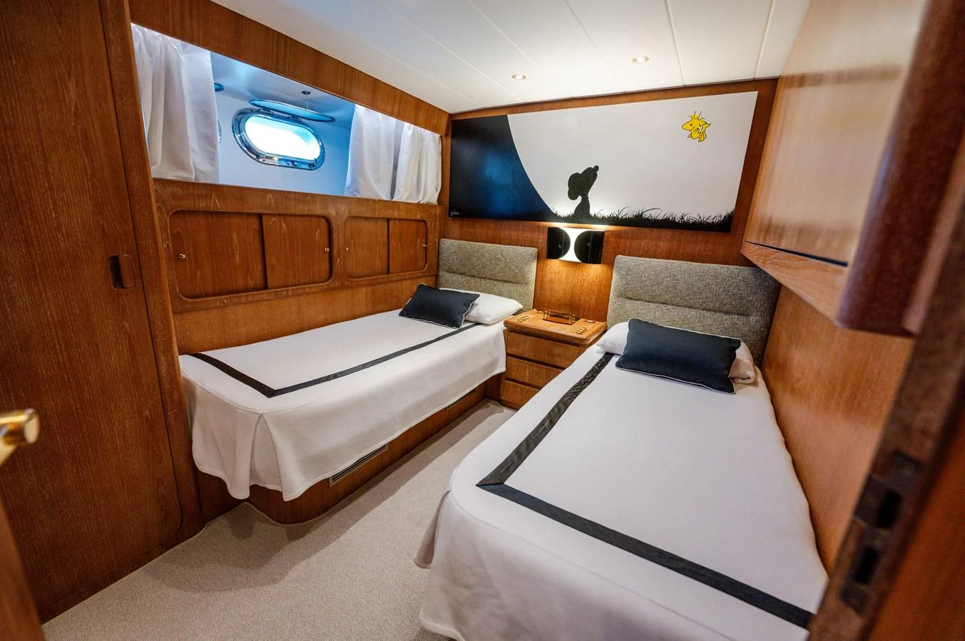 a room with two beds aboard VIS Yacht for Sale