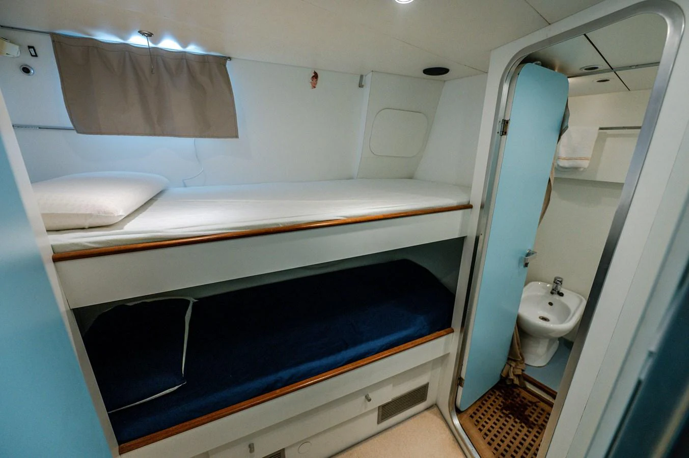 a bathroom with a sink and a mirror aboard VIS Yacht for Sale