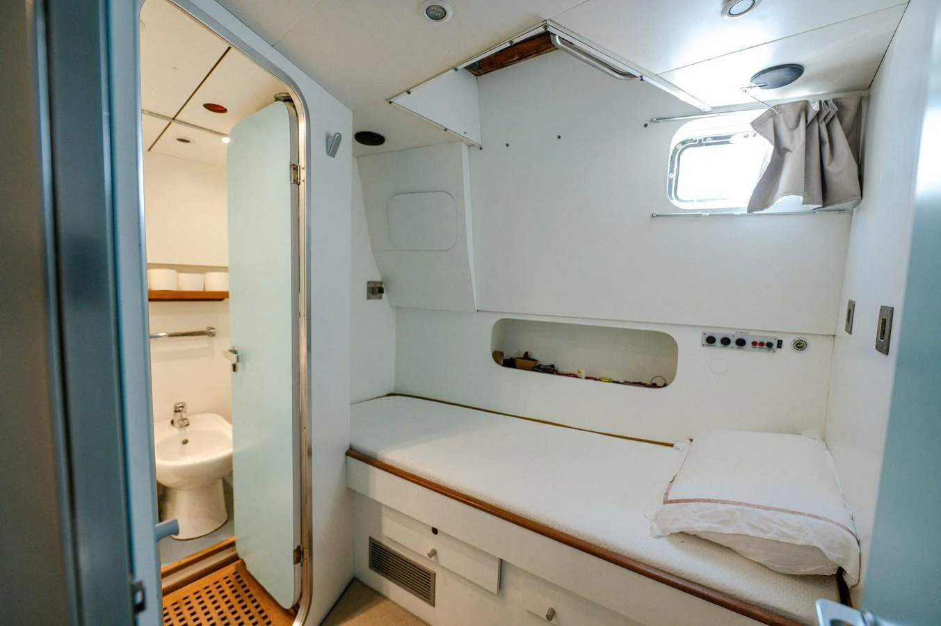a bathroom with a sink and a mirror aboard VIS Yacht for Sale