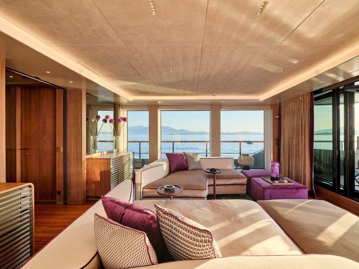 a living room with a large window aboard PARA BELLUM Yacht for Sale