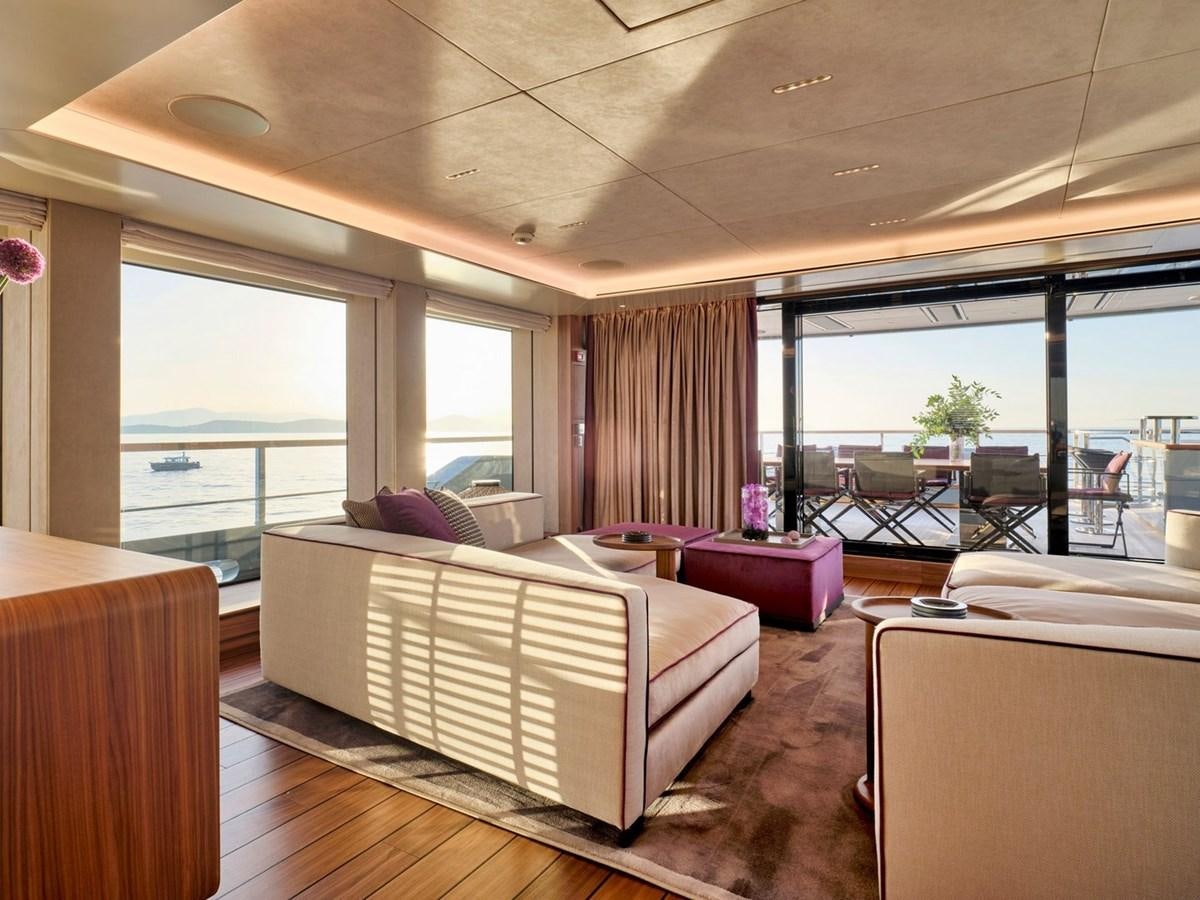 a room with a bed and a large window aboard PARA BELLUM Yacht for Sale