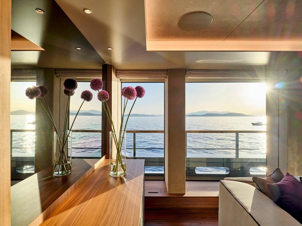 a room with a window and a view of the ocean aboard PARA BELLUM Yacht for Sale