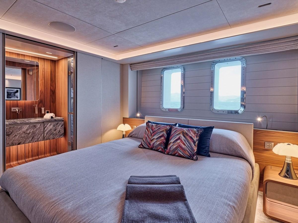 a bed in a room aboard PARA BELLUM Yacht for Sale