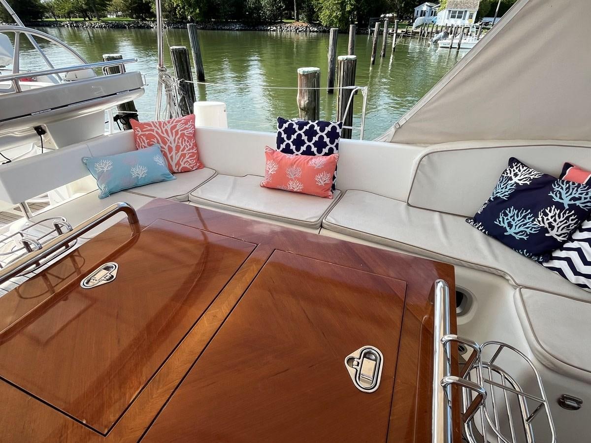 a boat with pillows on the deck aboard WEATHERLY Yacht for Sale