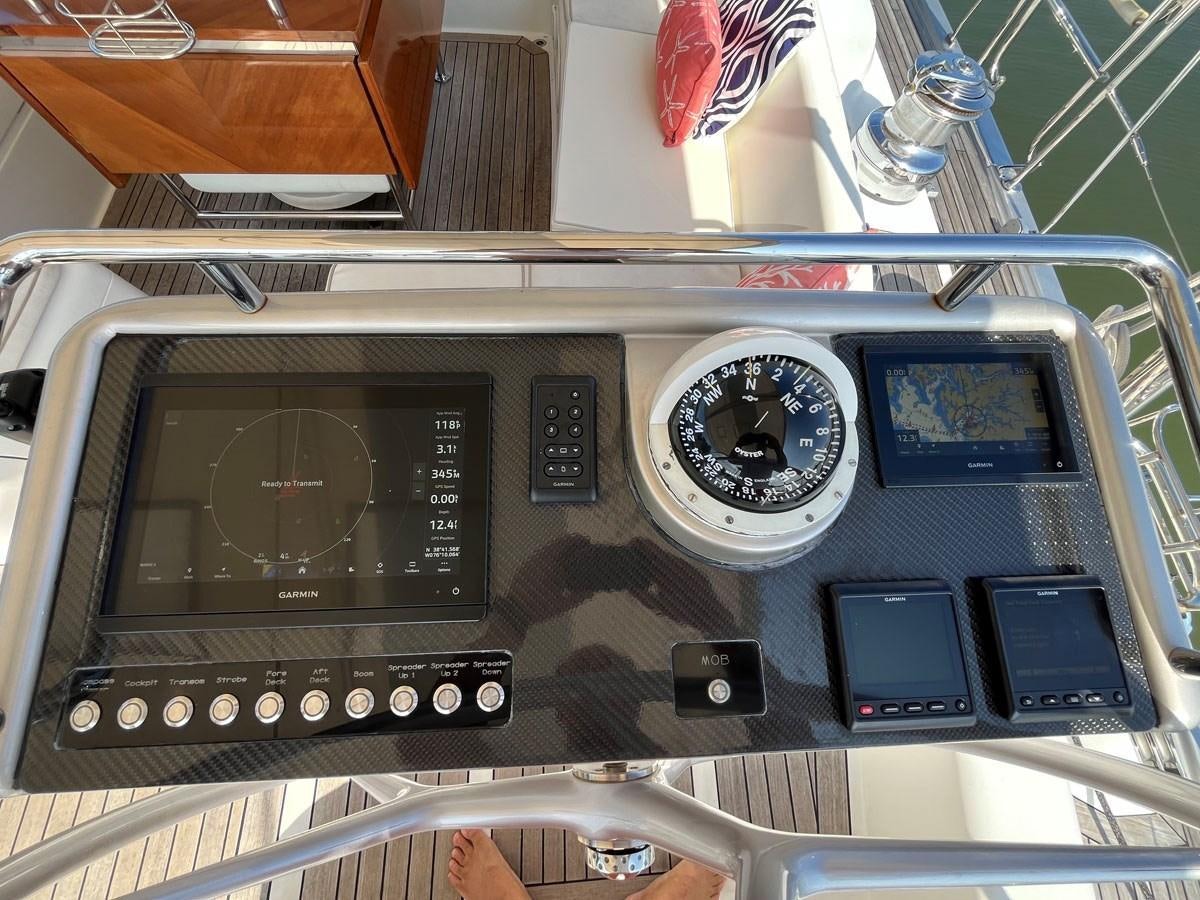 a group of cell phones on display aboard WEATHERLY Yacht for Sale