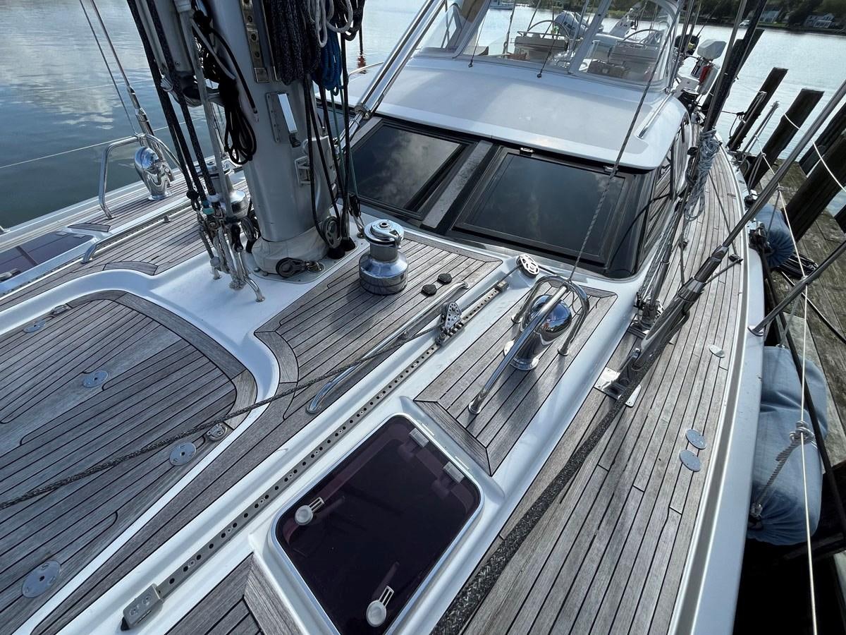 a large ship with a large deck aboard WEATHERLY Yacht for Sale