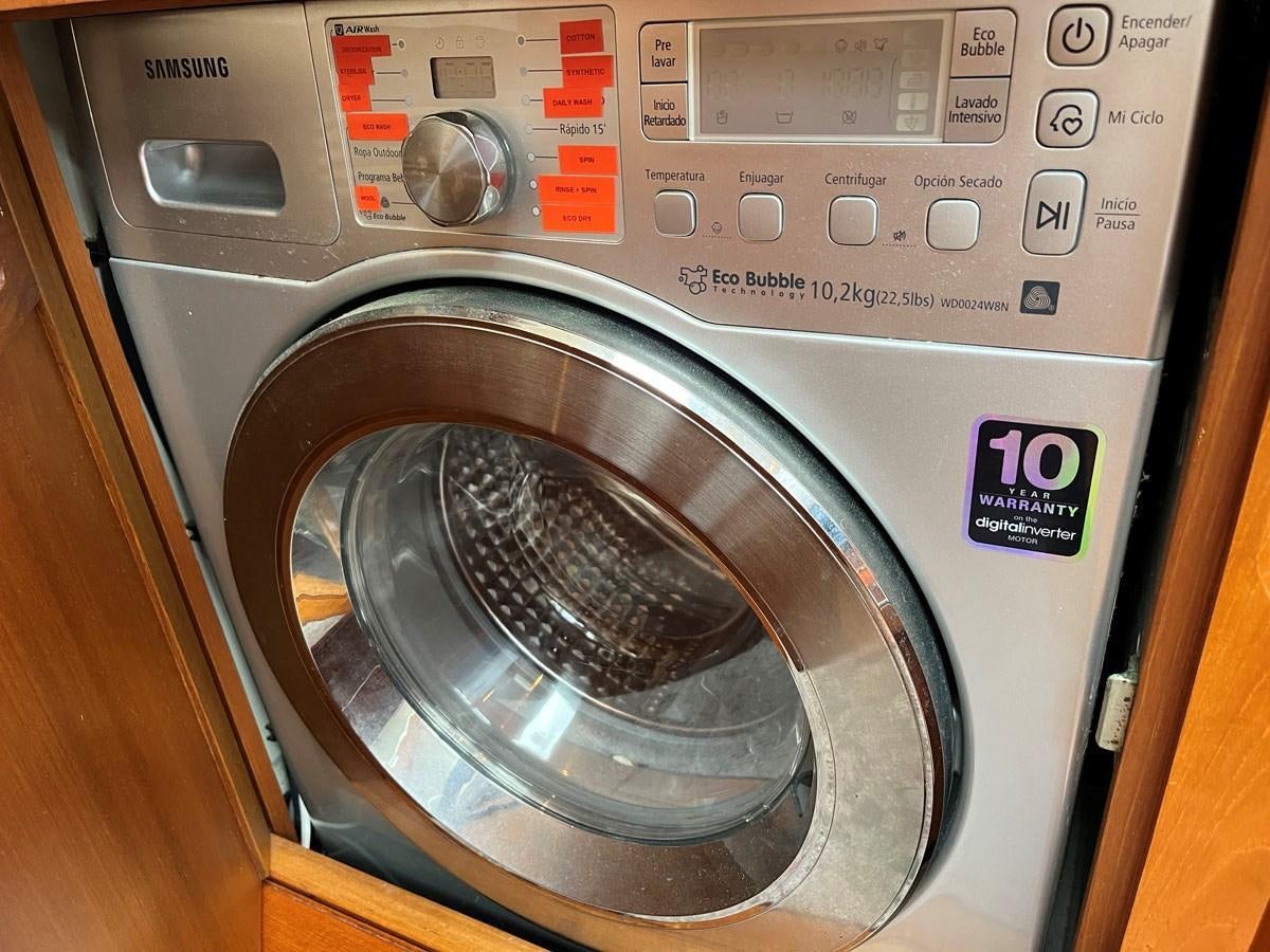 a washing machine with a glass door aboard WEATHERLY Yacht for Sale