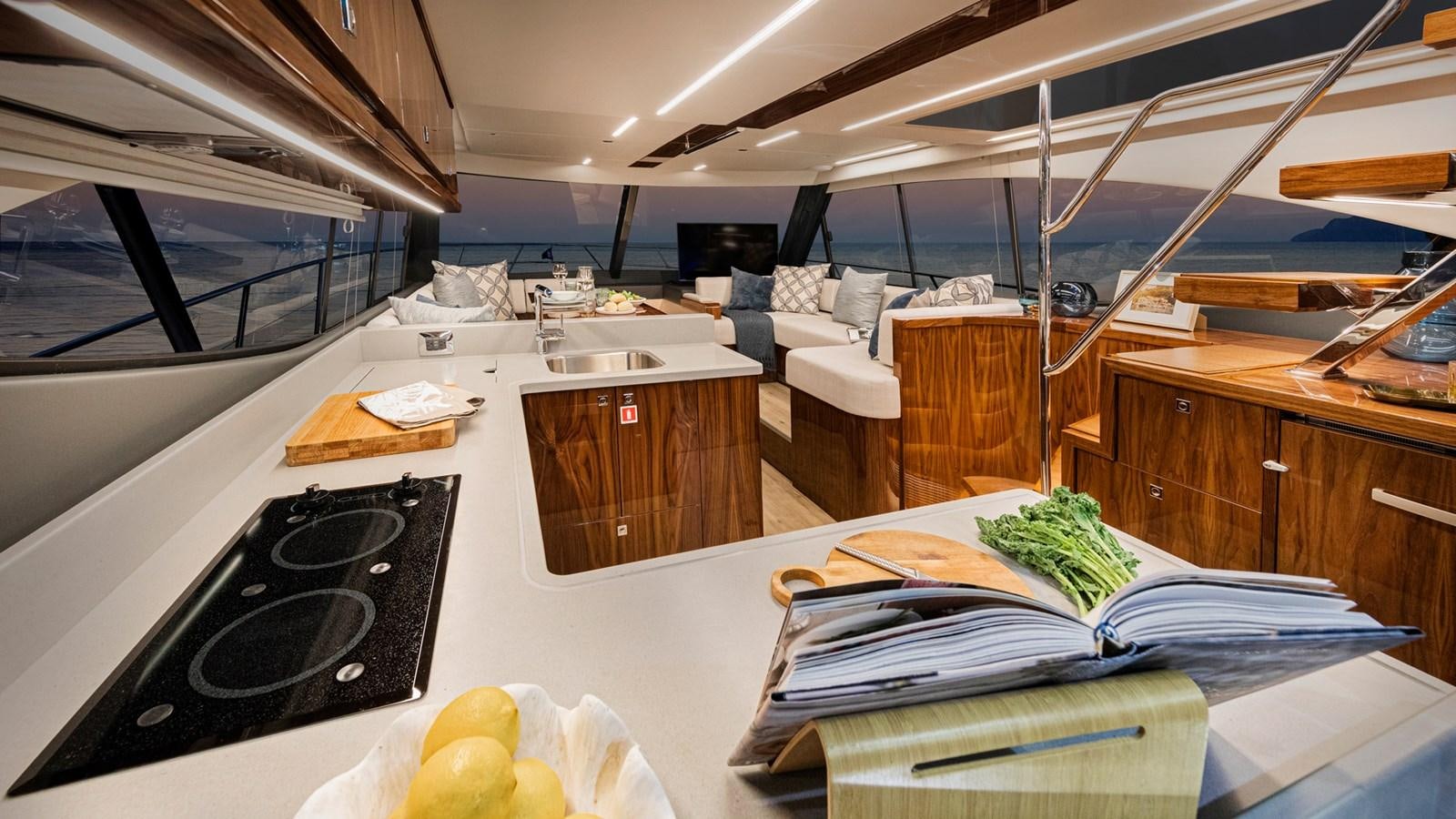 a kitchen with a large sink and a microwave oven aboard 72 SPORTS MOTOR YACHT Yacht for Sale