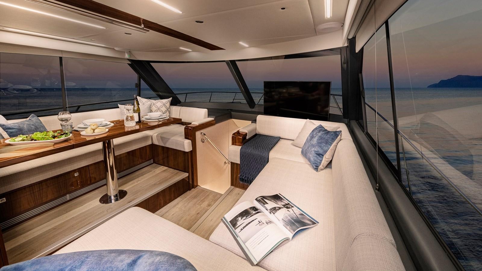 a room with a bed and a table aboard 72 SPORTS MOTOR YACHT Yacht for Sale