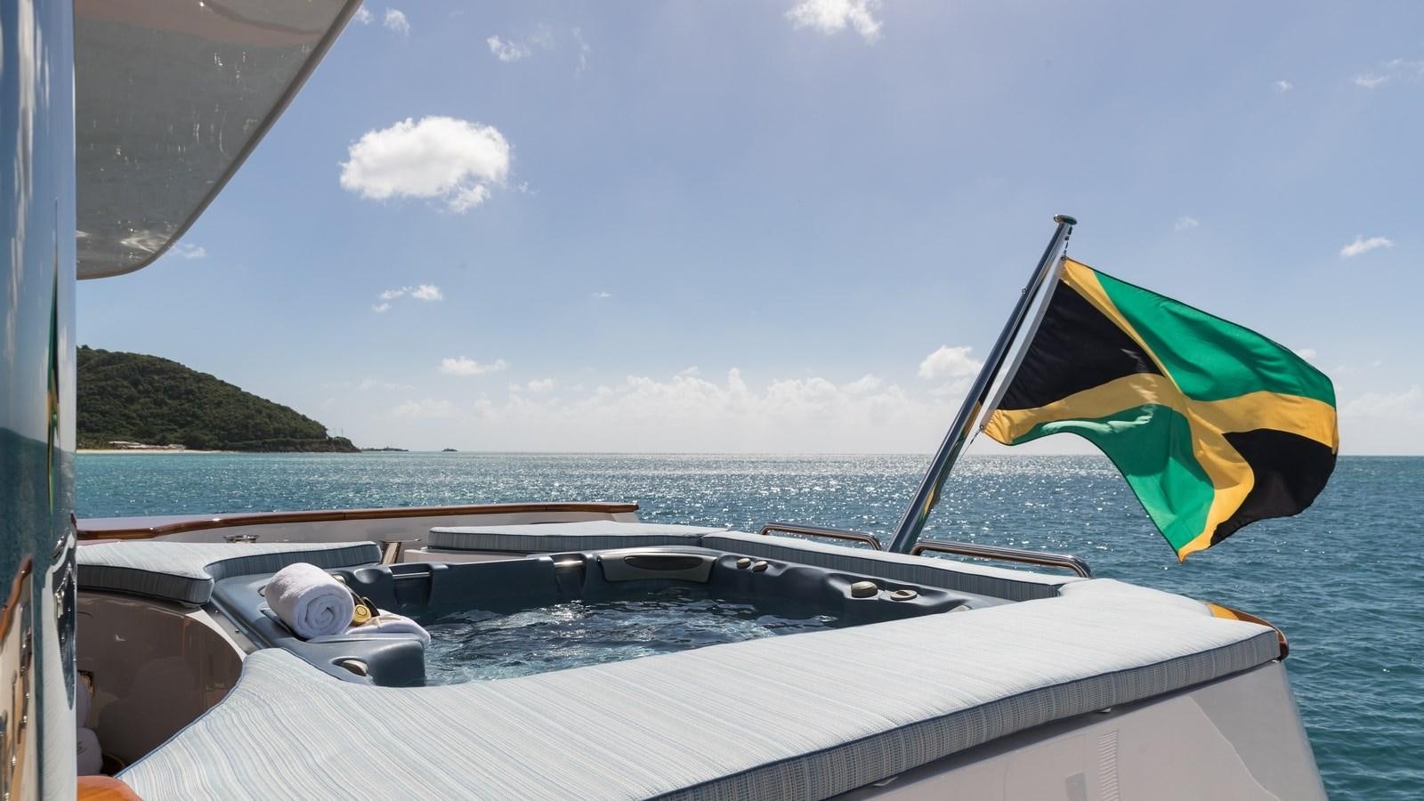 a flag on a boat aboard TOUCH Yacht for Sale