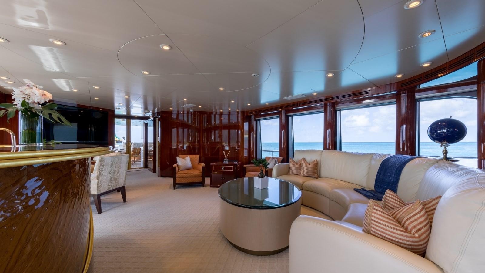 a living room with a large window aboard TOUCH Yacht for Sale