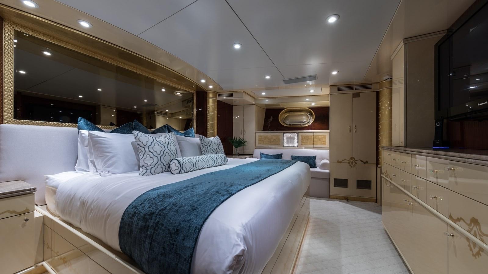 a large bed in a room aboard TOUCH Yacht for Sale