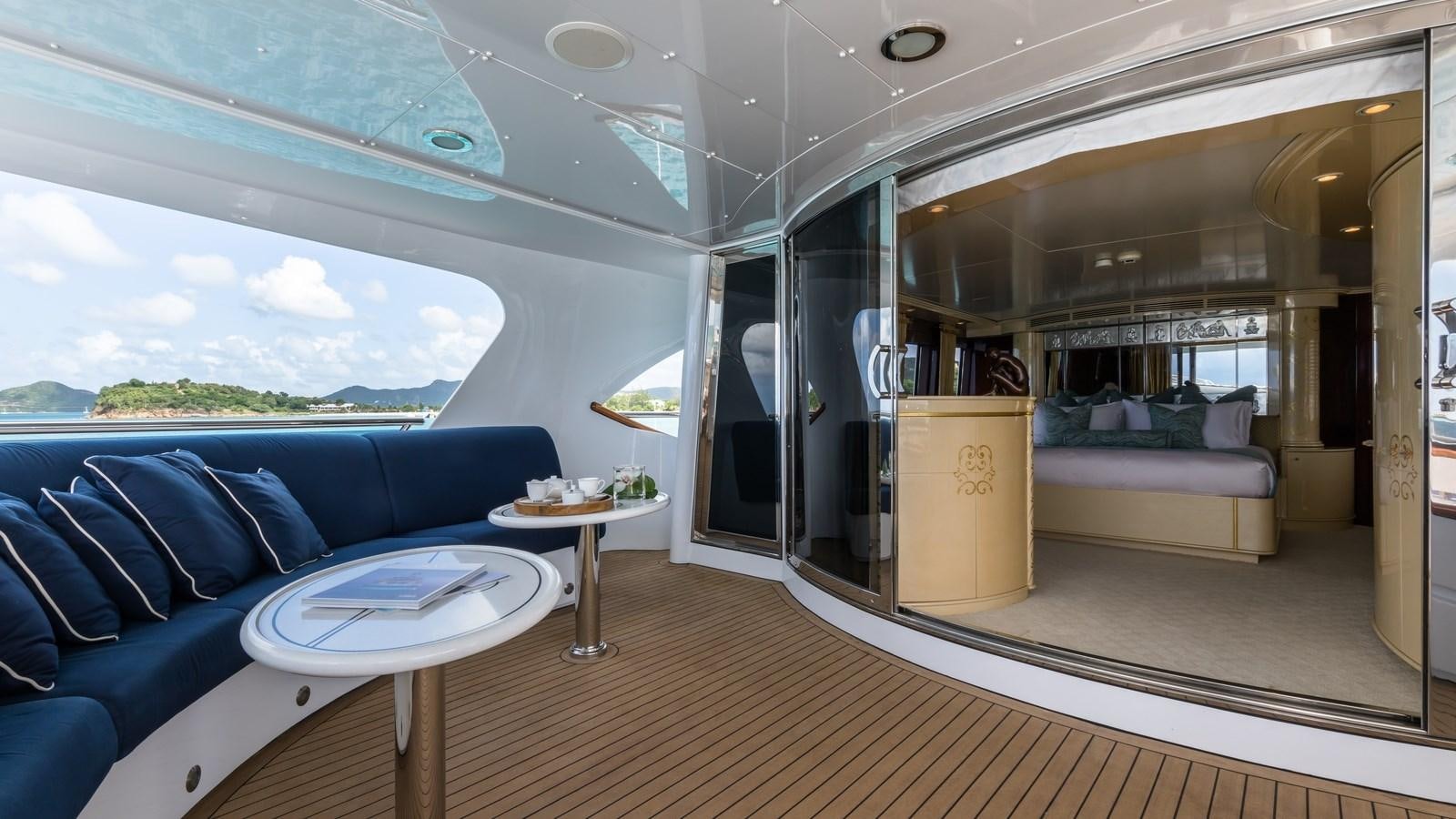 a room with a couch and a table aboard TOUCH Yacht for Sale