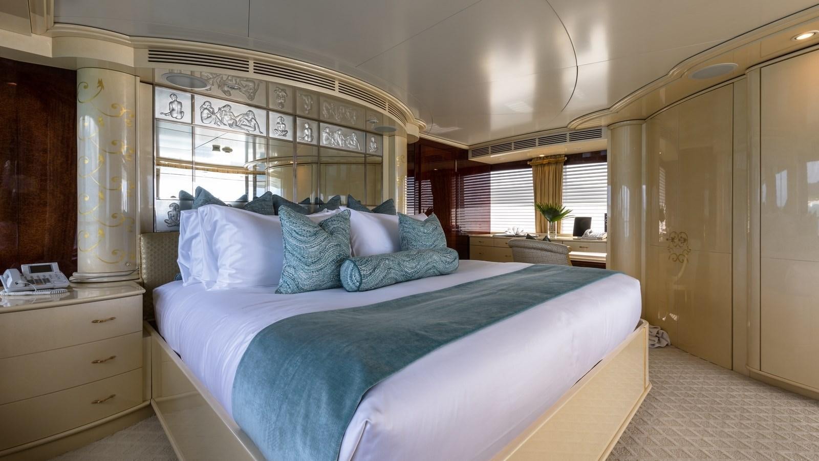 a bed in a room aboard TOUCH Yacht for Sale