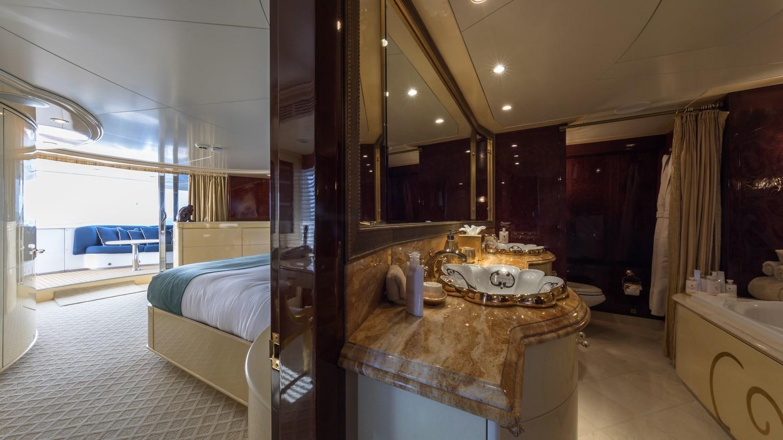 a bathroom with a large mirror aboard TOUCH Yacht for Sale