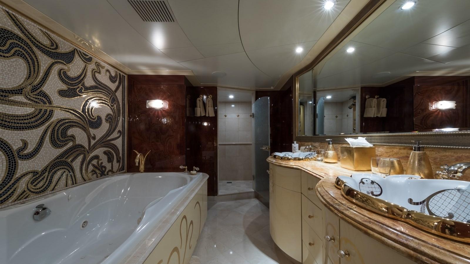 a bathroom with a large bathtub aboard TOUCH Yacht for Sale