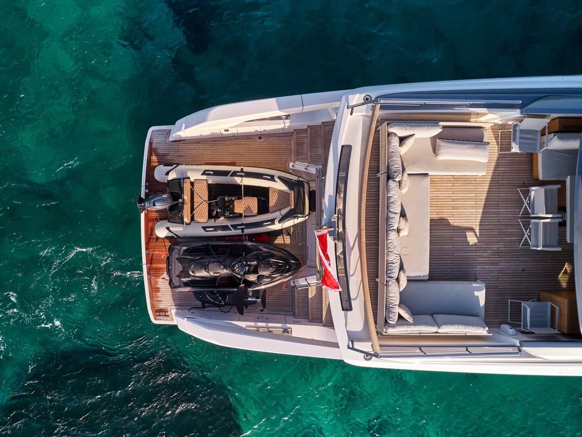 a trailer with a car on it aboard 2022 SANLORENZO SX76 #72 Yacht for Sale