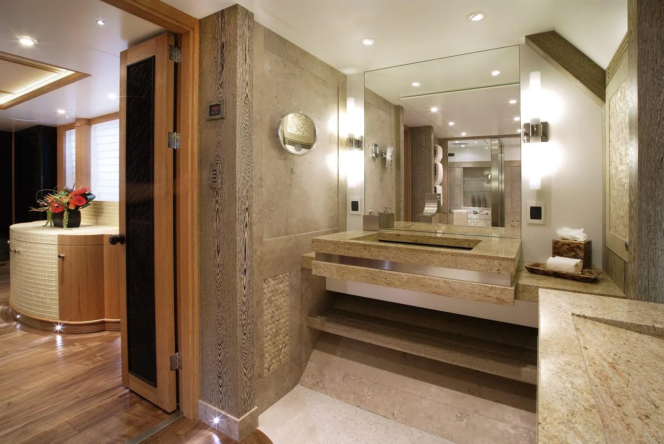 The yacht's bathroom features luxurious stone finishes and modern fixtures. aboard HEMISPHERE Yacht for Sale