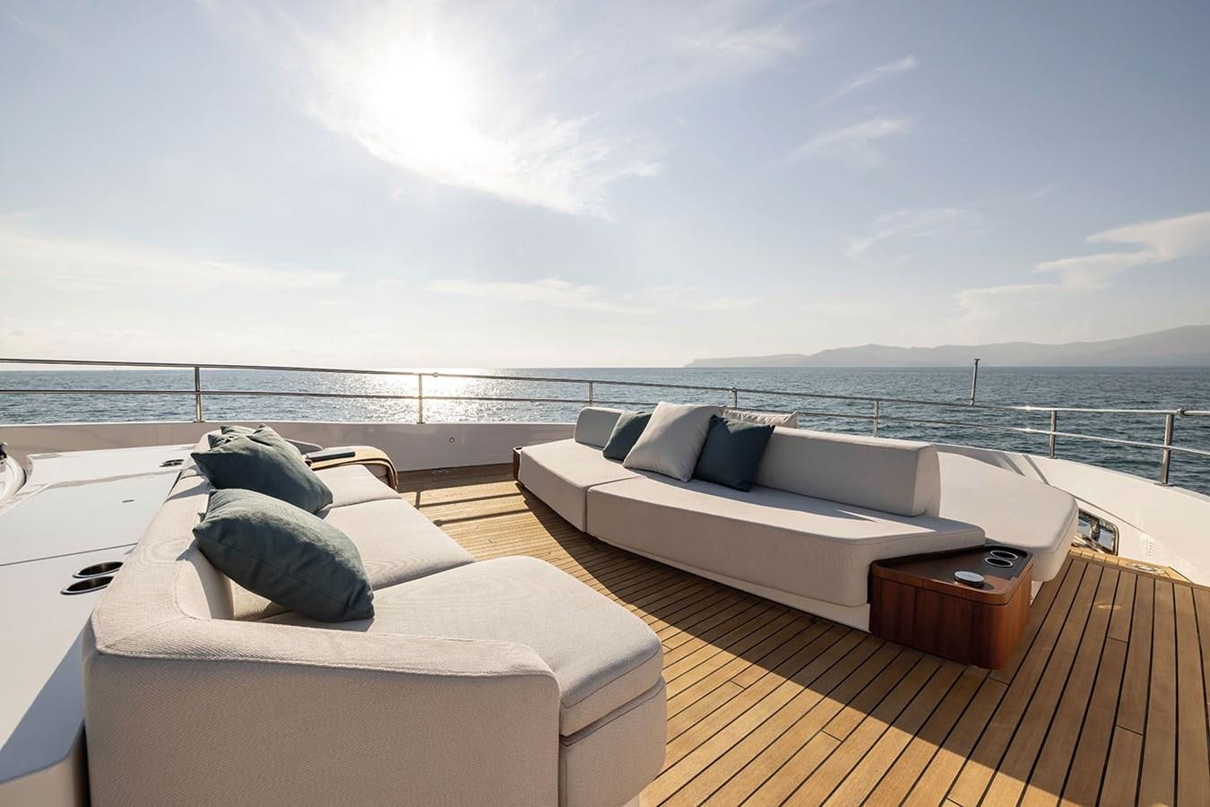 a bed and a couch on a boat aboard MAGELLANO Yacht for Sale