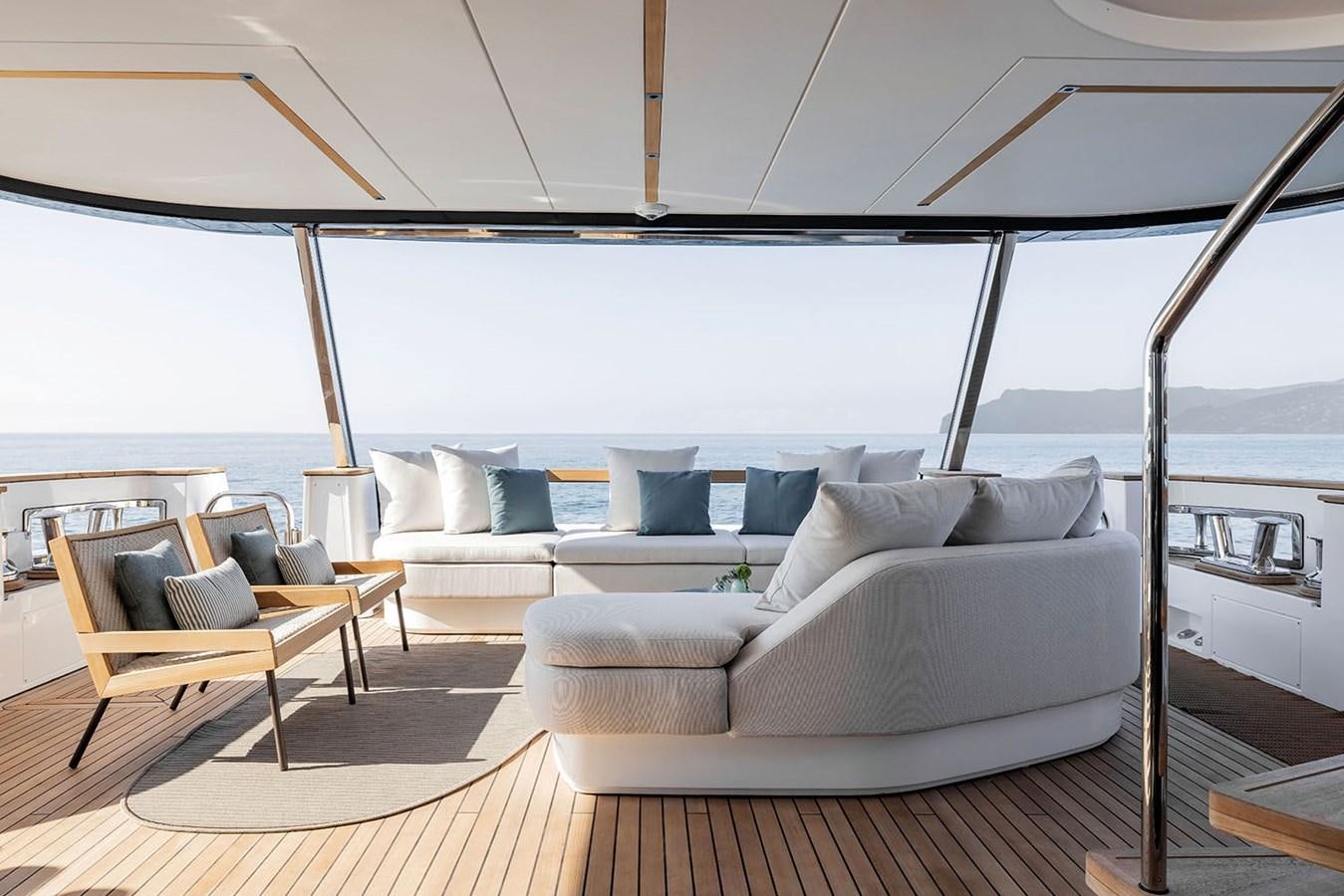 a living room with a large window aboard MAGELLANO Yacht for Sale