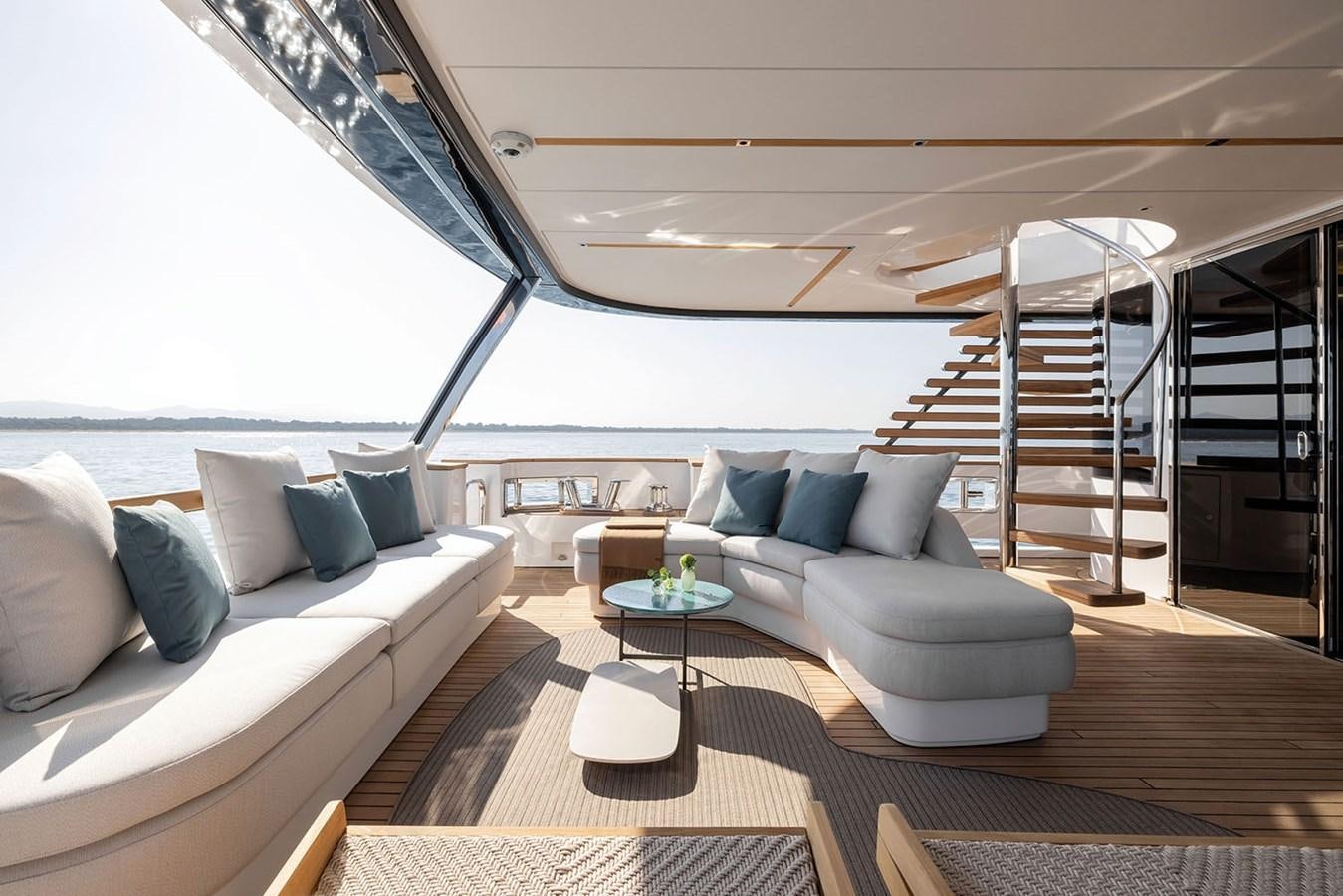 a living room with a large window aboard MAGELLANO Yacht for Sale