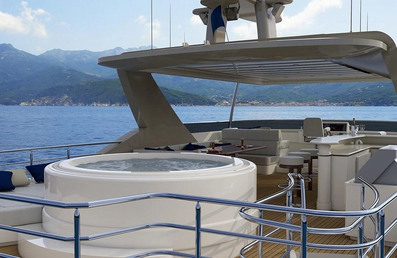 The sundeck features a luxurious hot tub with stunning views of the surrounding waters. aboard NORTHLAND Yacht for Sale