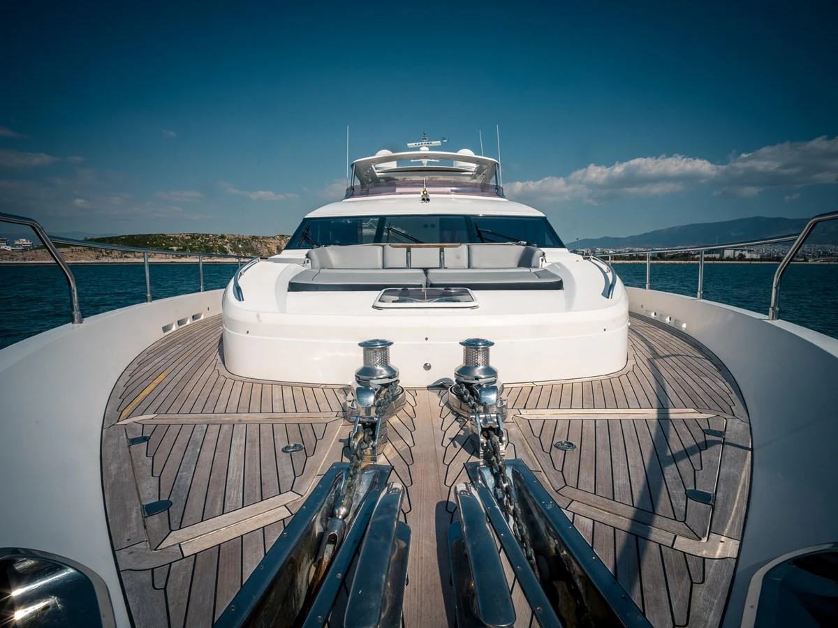 The foredeck of the yacht features a spacious sunbathing area with sleek, modern design elements. aboard 4 LIFE Yacht for Sale