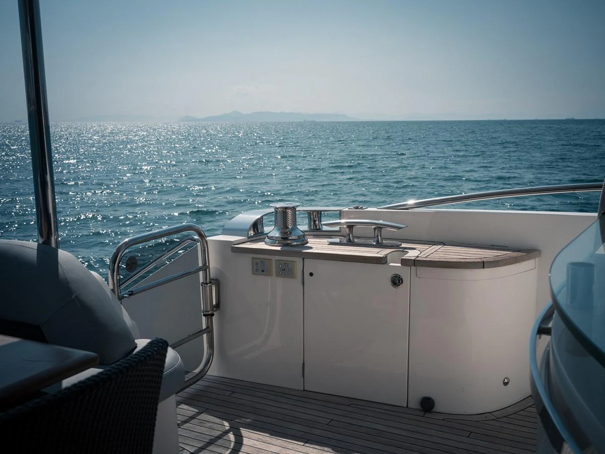 The aft deck offers a serene view of the open sea with a sleek, modern design. aboard 4 LIFE Yacht for Sale