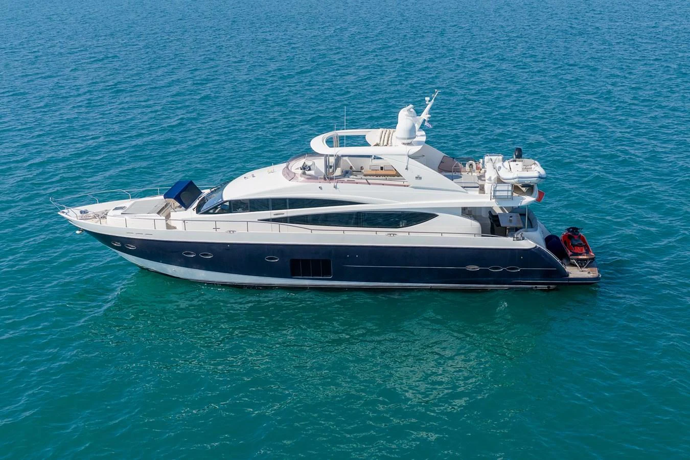 A sleek and modern yacht cruising on calm blue waters. aboard 4 LIFE Yacht for Sale