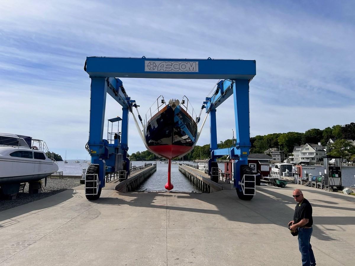 a person standing next to a machine aboard PRIVATE Yacht for Sale