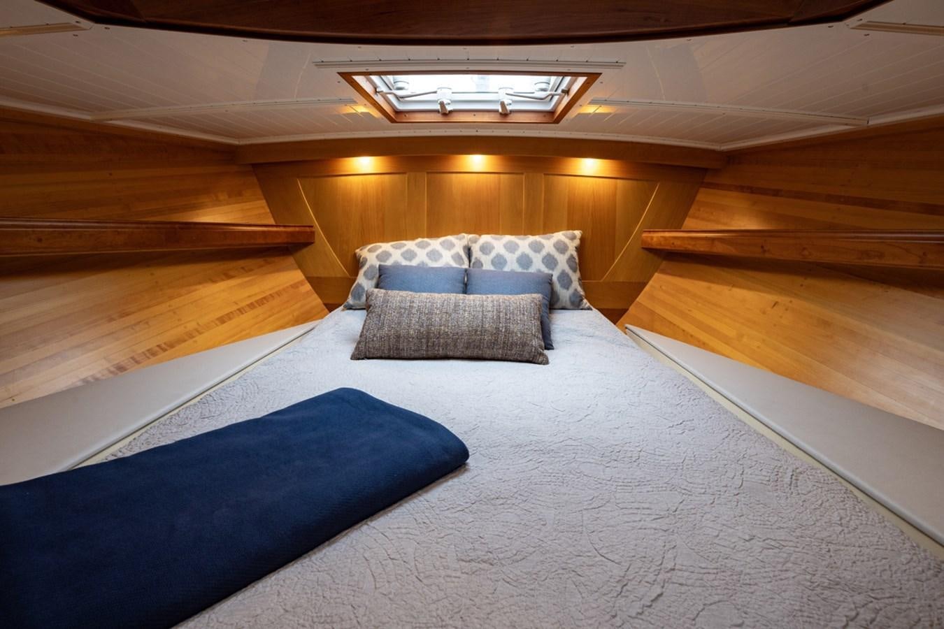 a bed in a room aboard PRIVATE Yacht for Sale
