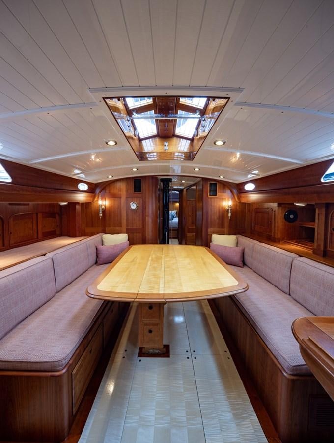 a room with a row of seats aboard PRIVATE Yacht for Sale