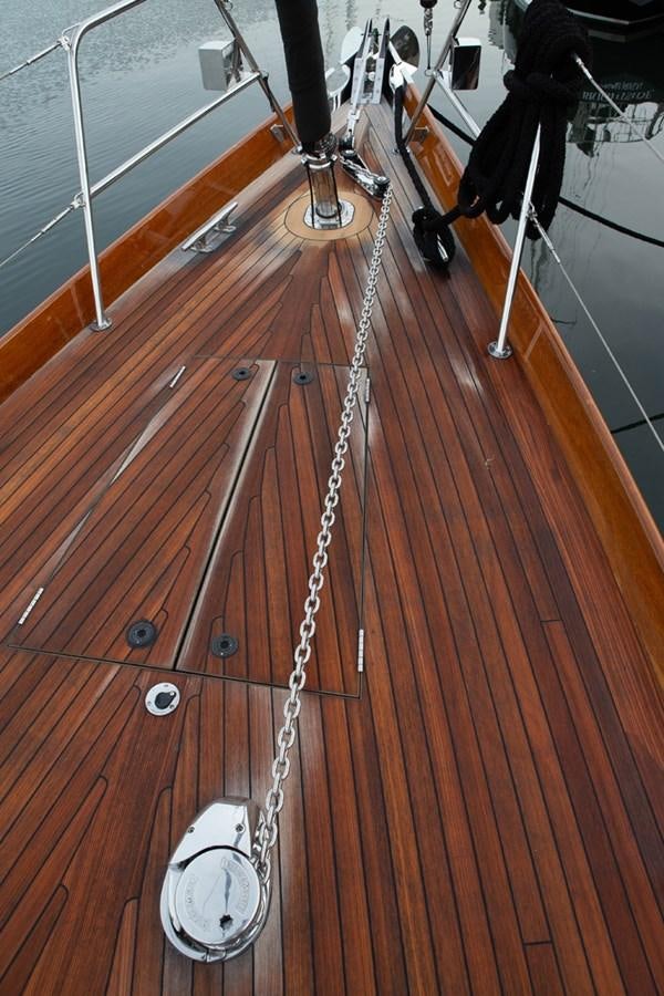 a person climbing a rope aboard PRIVATE Yacht for Sale
