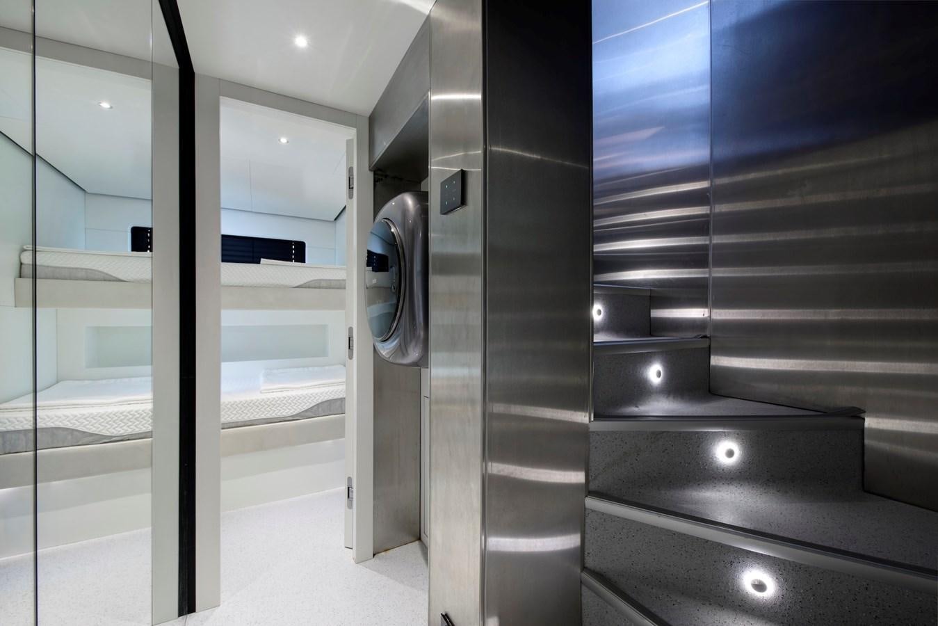 a room with glass walls aboard MAZU 82 Yacht for Sale