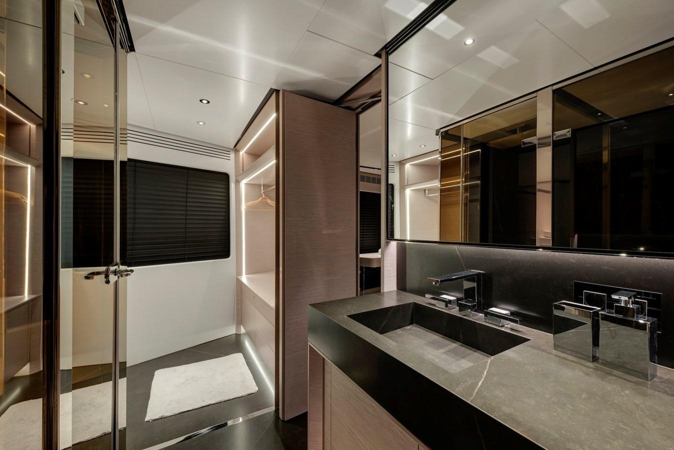 a modern looking kitchen aboard MAZU 82 Yacht for Sale