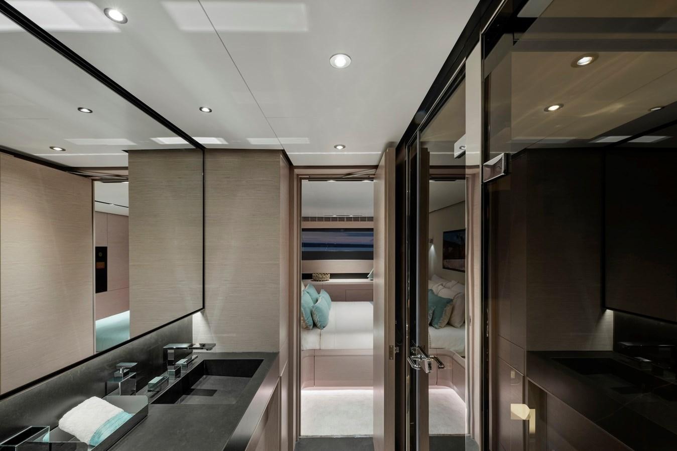 a bathroom with a sink and a mirror aboard MAZU 82 Yacht for Sale