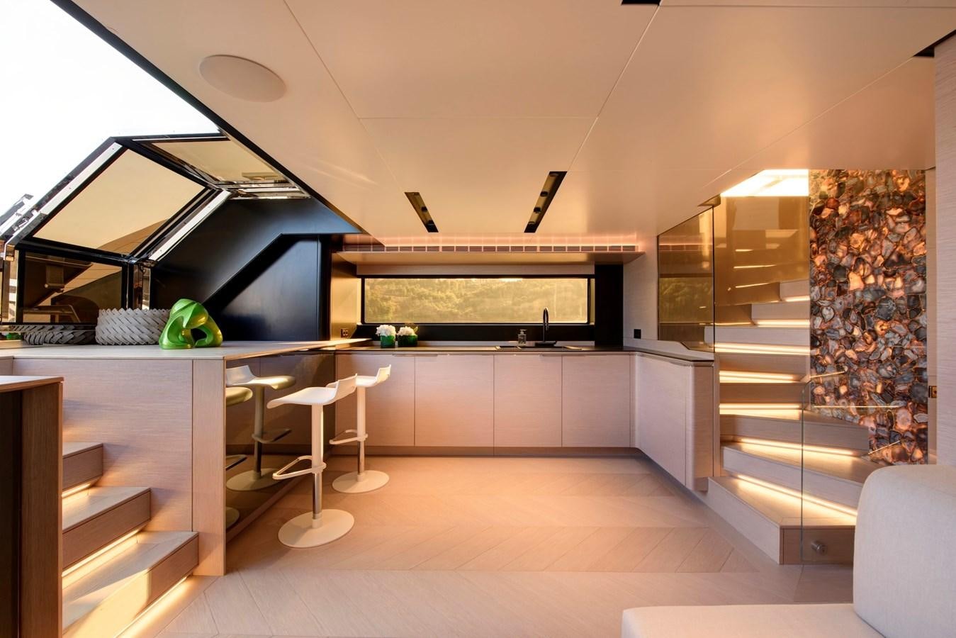 a modern house with a staircase aboard MAZU 82 Yacht for Sale