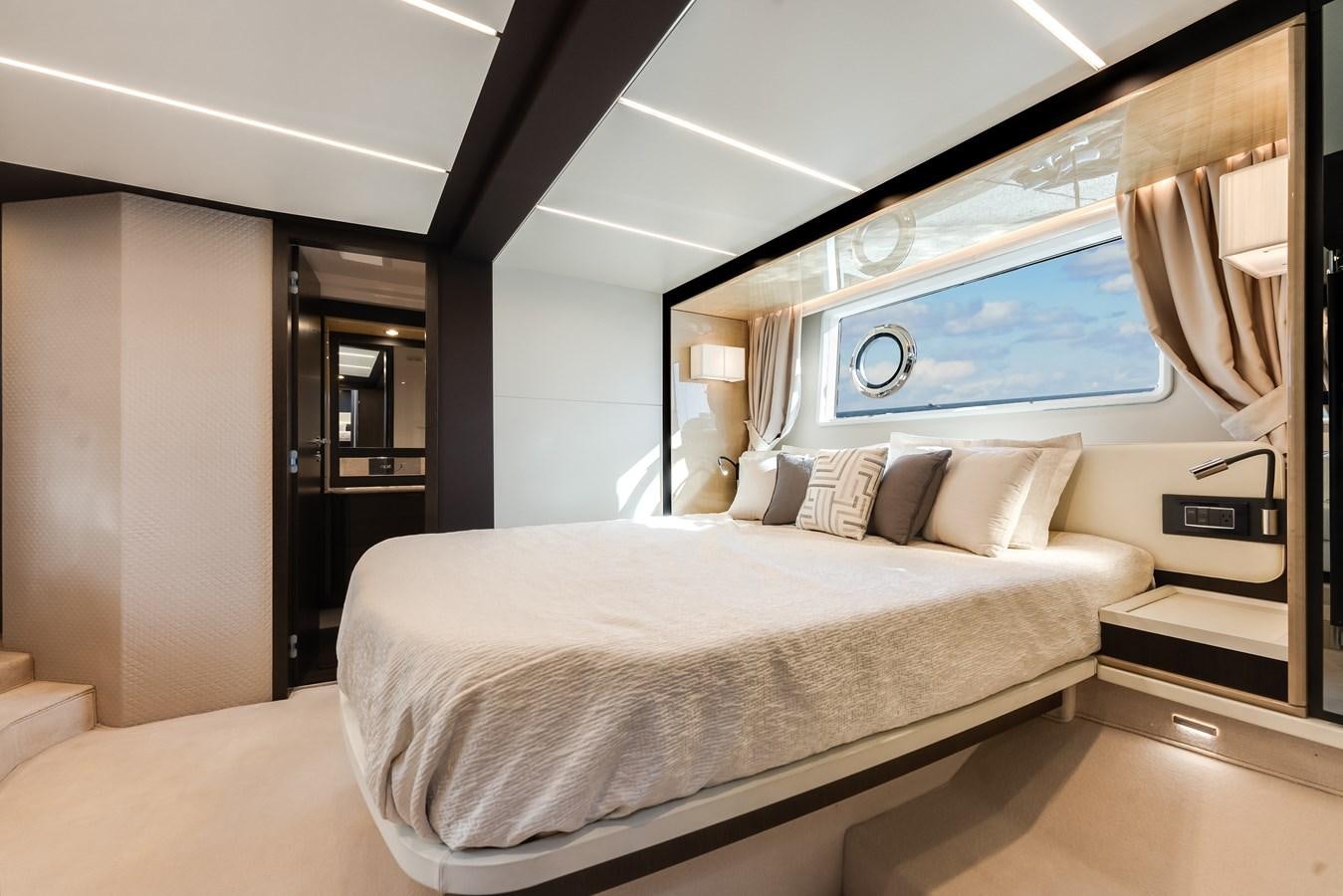 a bed in a room aboard TRUTH SERUM Yacht for Sale