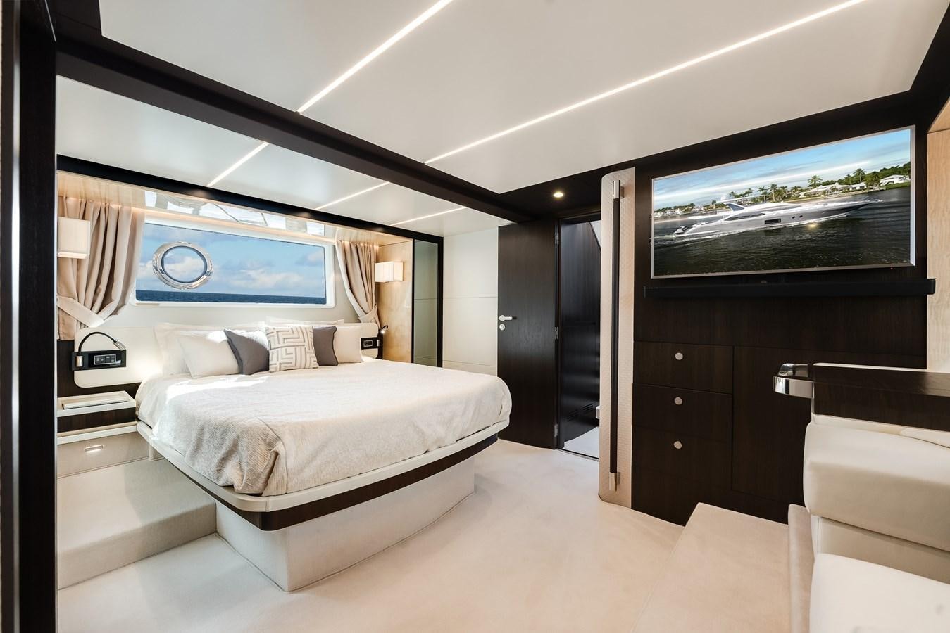 a room with a bed and a tv aboard TRUTH SERUM Yacht for Sale