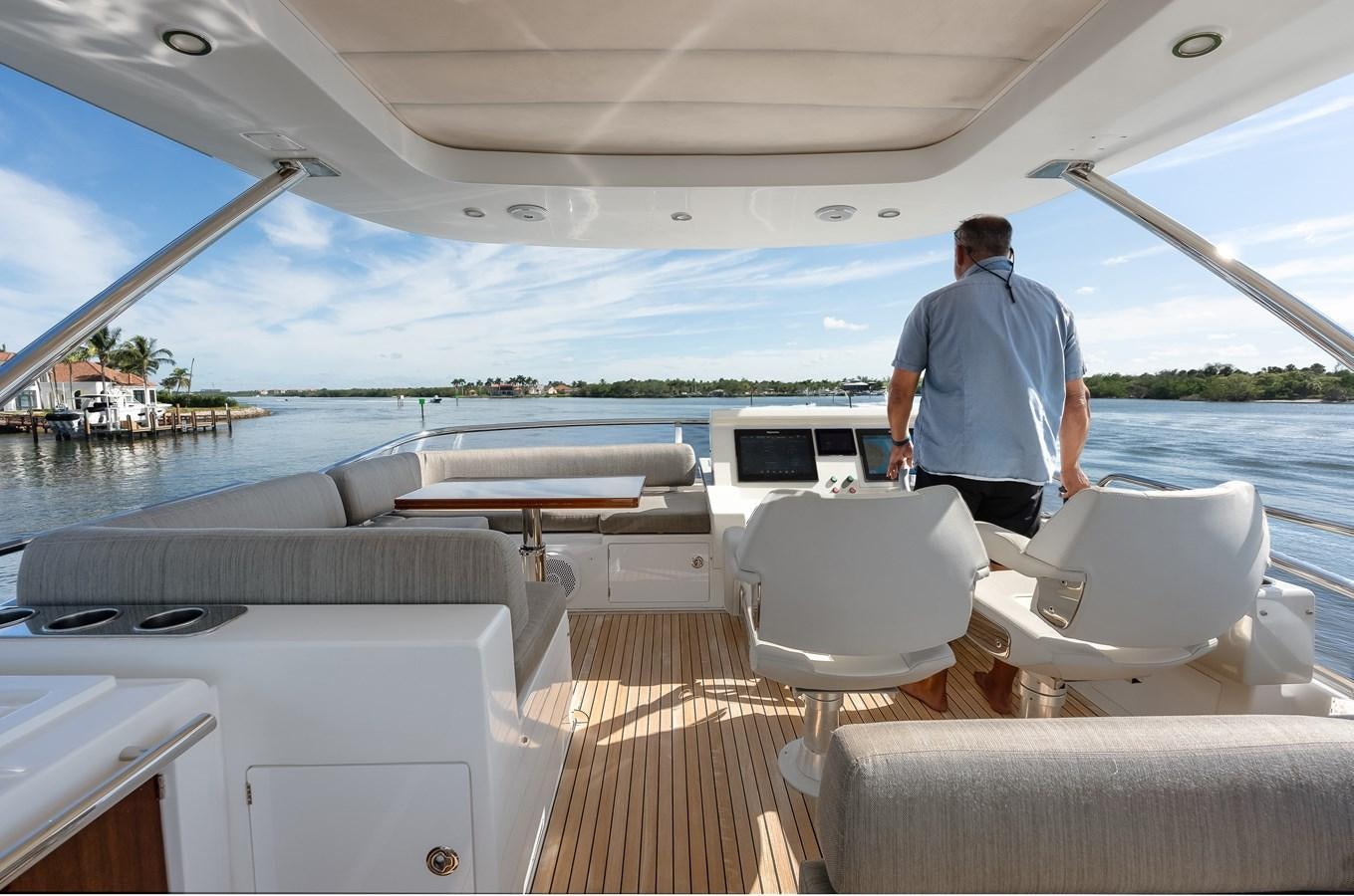 a man standing on a boat aboard TRUTH SERUM Yacht for Sale