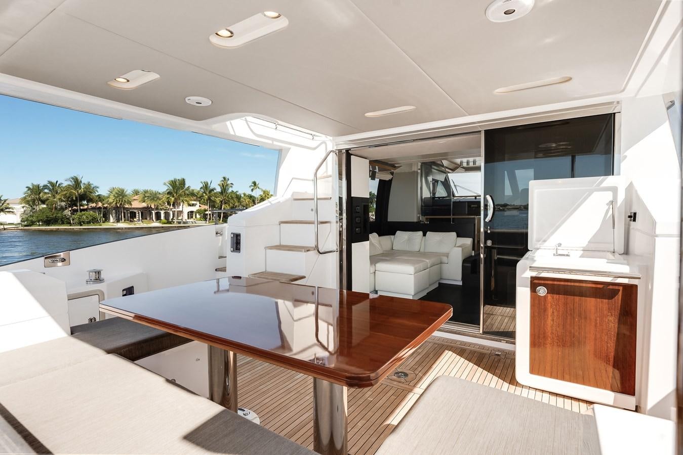 a large open kitchen and dining area aboard TRUTH SERUM Yacht for Sale