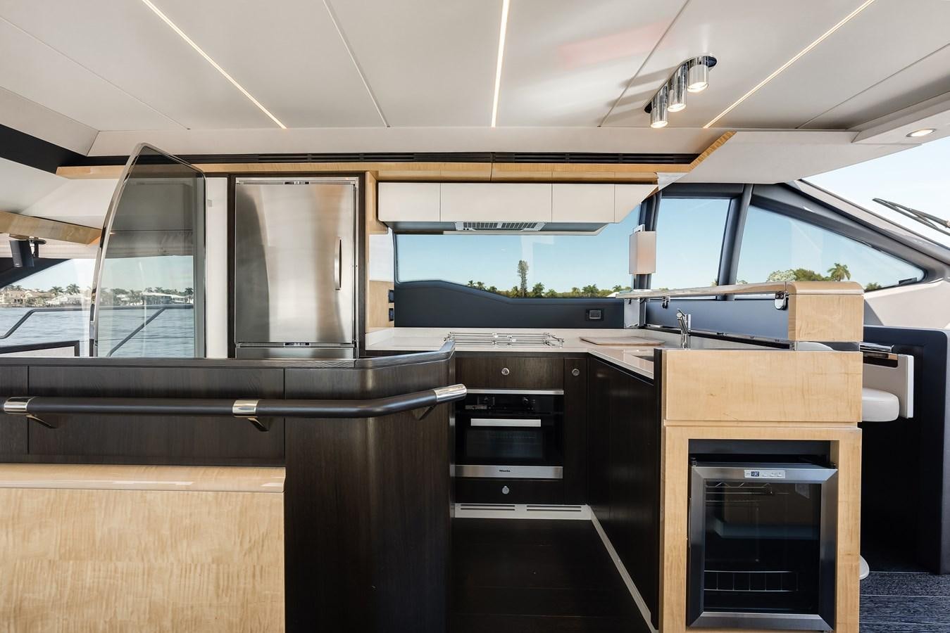 a room with a couple of ovens and a window aboard TRUTH SERUM Yacht for Sale