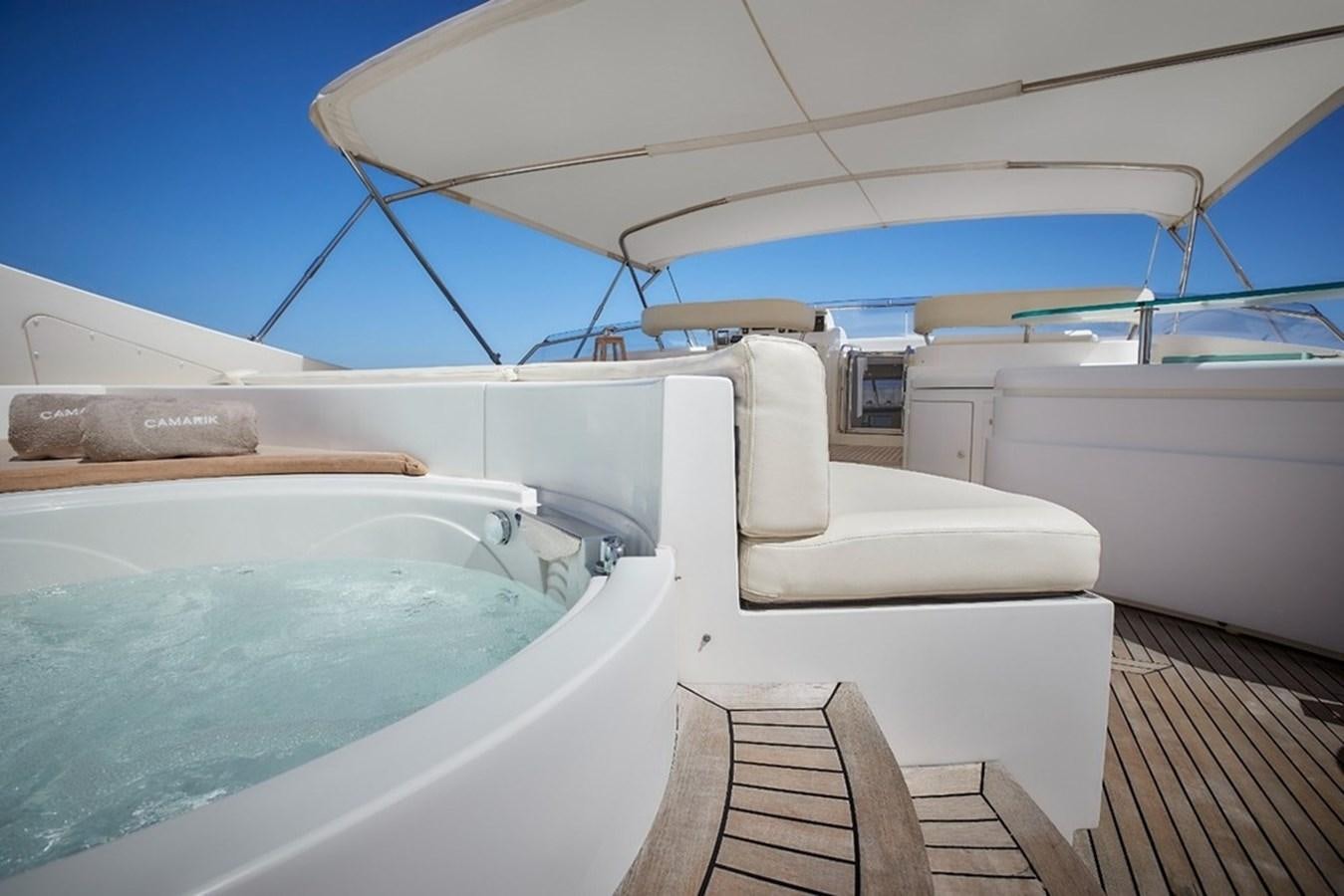 a boat with a wooden dock aboard CAMARIK Yacht for Sale