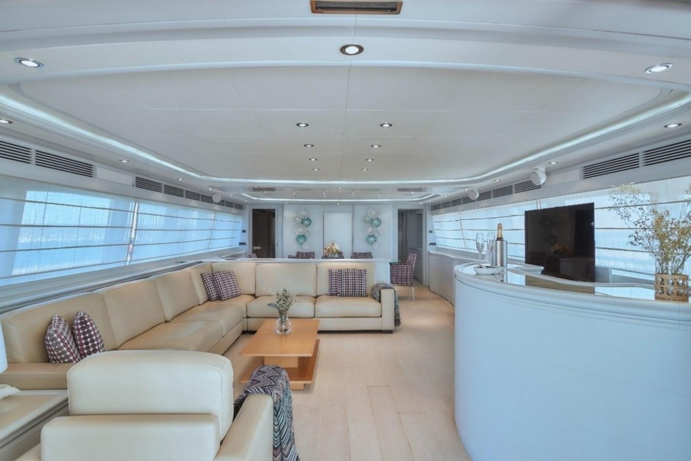 a living room with a large window aboard CAMARIK Yacht for Sale