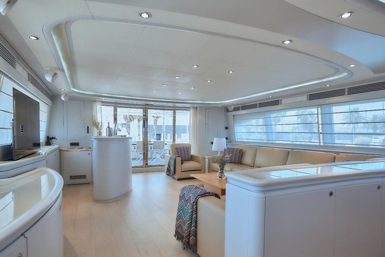 a large white kitchen with a large open floor plan aboard CAMARIK Yacht for Sale