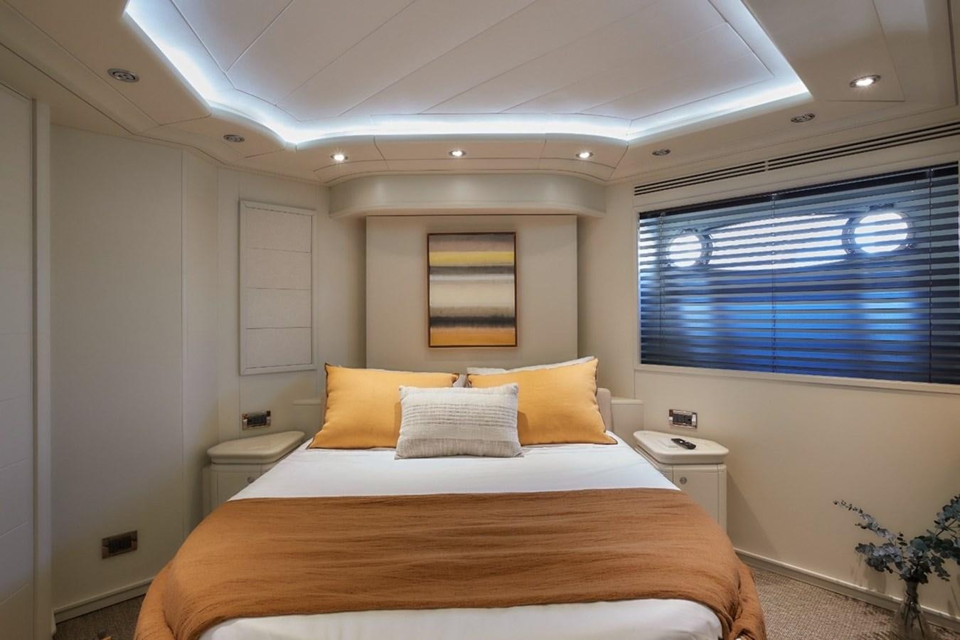 a bed with a large bed aboard CAMARIK Yacht for Sale